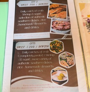 Menu for Southern Thai set meal options highlighting price and dish variety, including crab, shrimp, squid, rice, homemade desserts, and drinks.