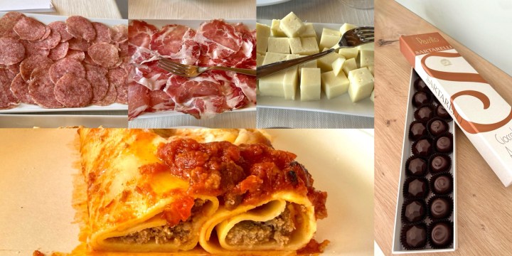 A platter of various types of sliced salami and cured meats.
