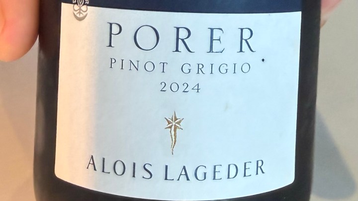 Close-up of a wine bottle label featuring Porer Pinot Grigio 2024 from Alois Lageder.
